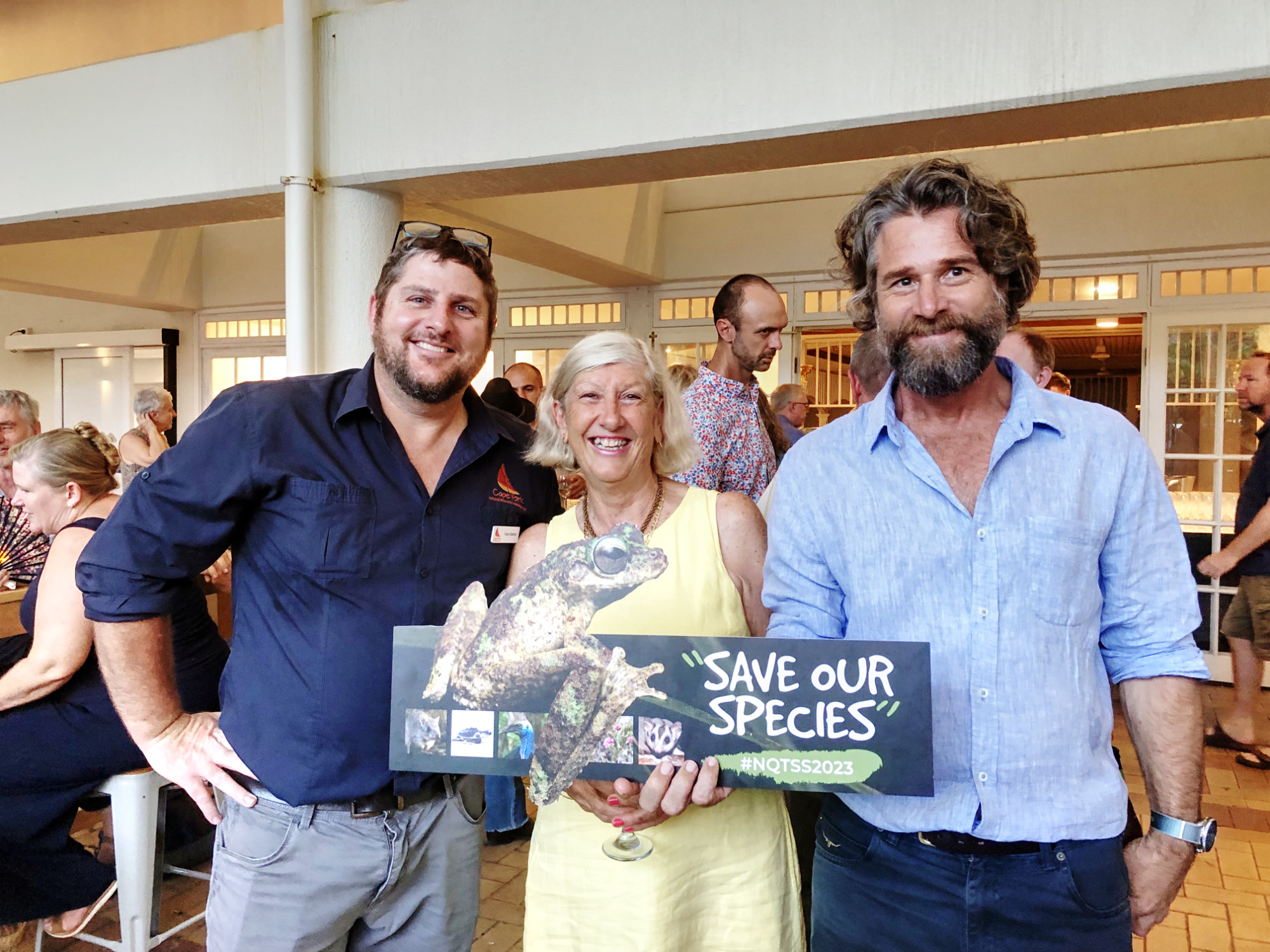 Cape York NRM Staff standing with a 'Save our species' cardboard cut-out at the Threatened Species Symposium